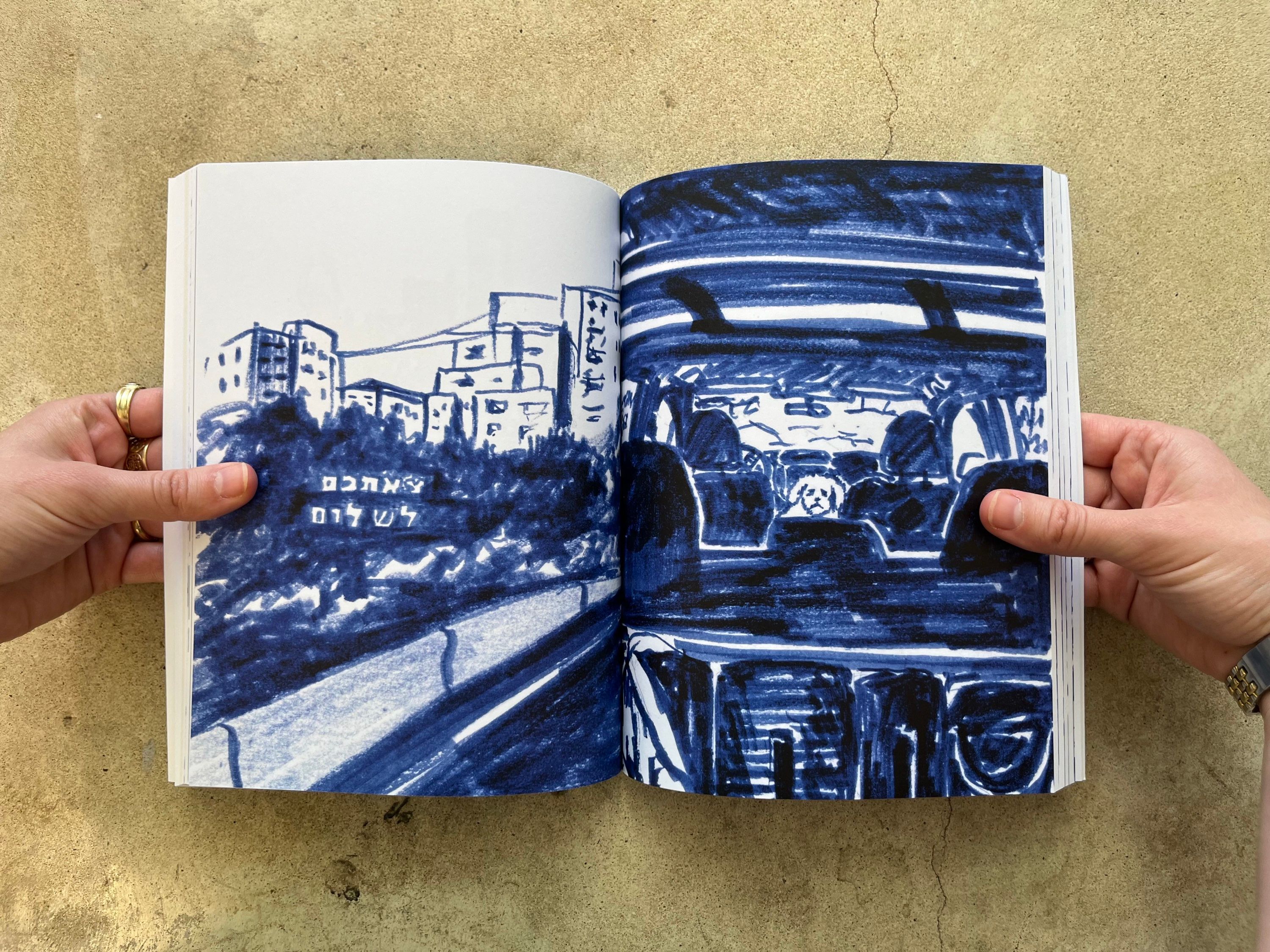 A spread of blue marker street scenes