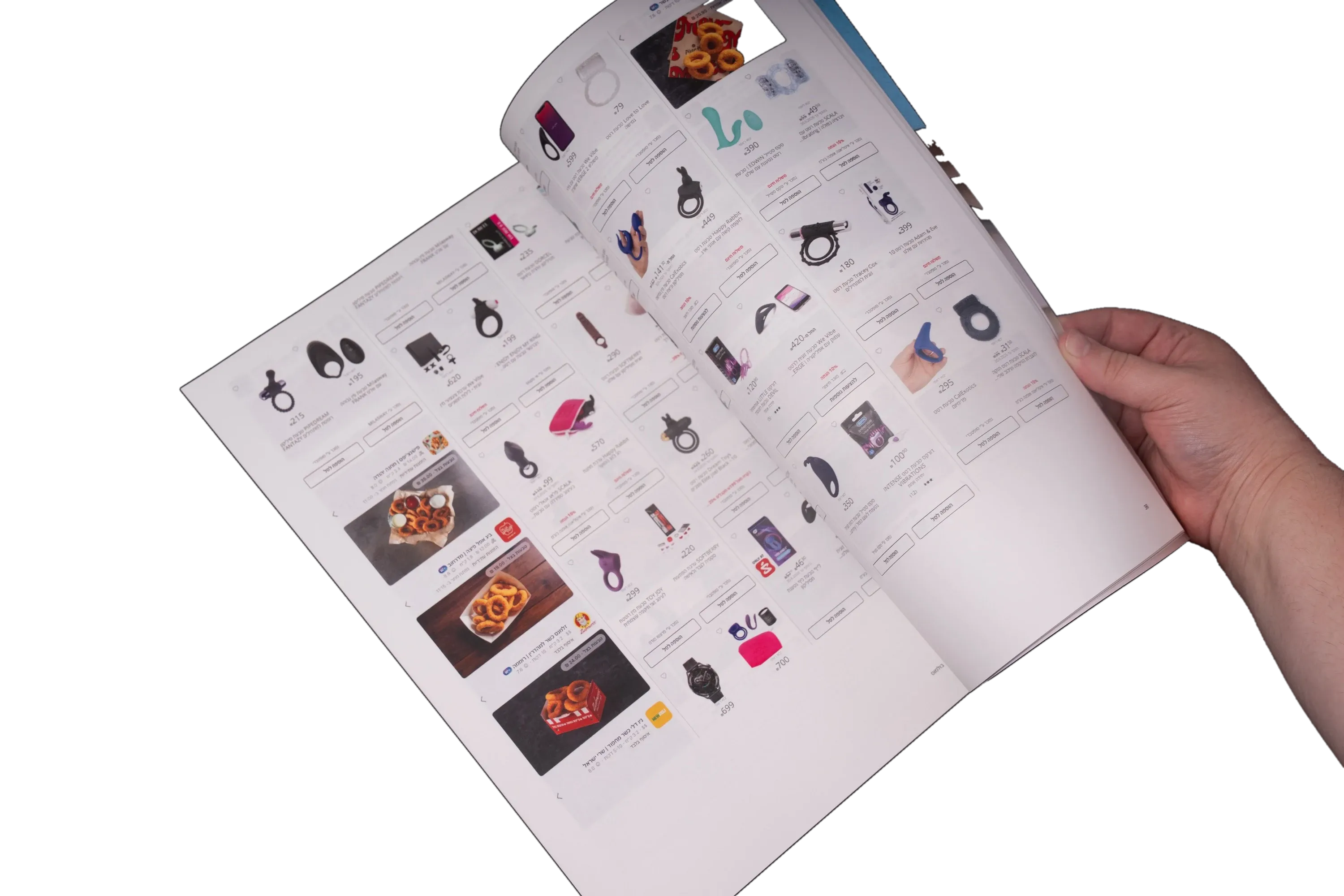 A hand turning a page covered in a catalogue of small product images